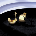 Load image into Gallery viewer, Solid Silver and 14k Gold Huggies
